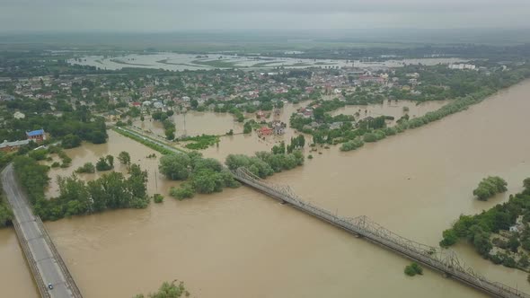 Top View of the Bridge Over the Dniester River During Floods. Spilled River, Climate Change, Natural