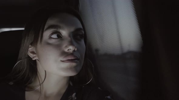 Thoughtful Traveler Looks Out The Window alt