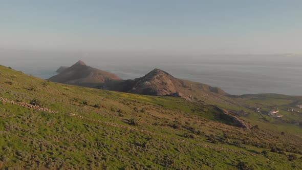 Aerial panoramic view from Pico do Facho with sea in background, Madeira in Portugal alt