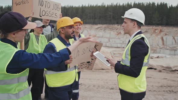 Workers on Strike Having Confrontation With Quarry Manager alt