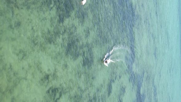 Tanzania Vertical Video  Boat Boats in the Ocean Near the Coast of Zanzibar Aerial View alt