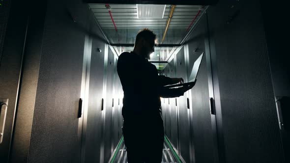 IT Engineer at Server Racks in Data Center. alt