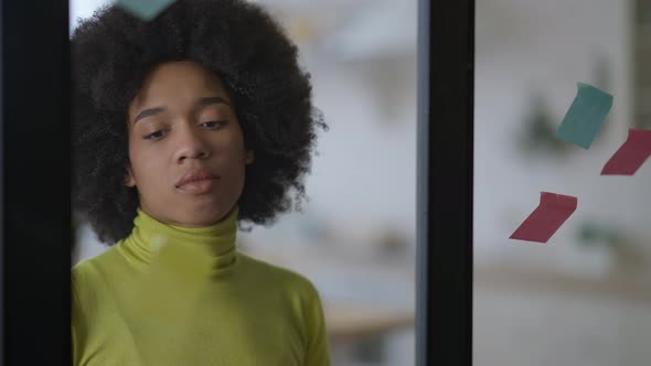 Stressed Upset African American Woman Taking Off Sticky Notes From Mirror Stock Footage 3397