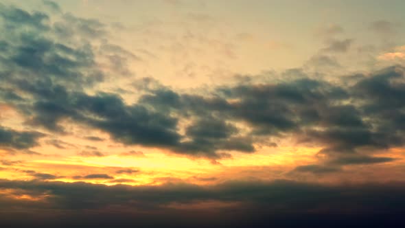 Orange Cloudy Sky Turning to Deep Clouds with Beautiful Surface