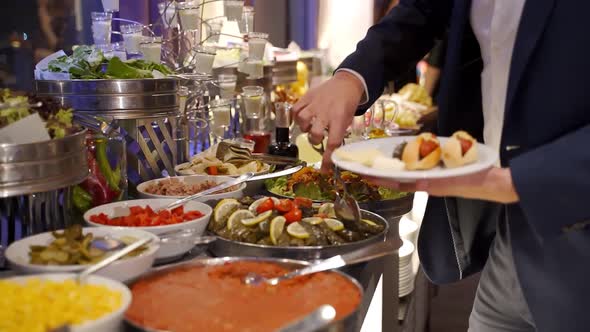 Catering banquet table with baked food. Sandwich open buffet.