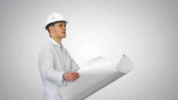 Engineer Dancing with a Blueprint Being in a Good Mood on Gradient Background. alt