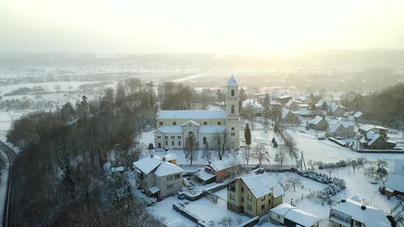 Aerial View Of Raudondvaris Church In Winter Time