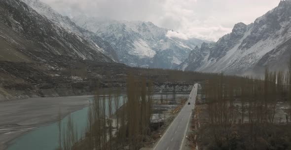 Tranquil Lake Surrounded By Rocky Slopes Mountains At Attabad Lake, Gojal Valley, Hunza, Gilgit-Balt alt