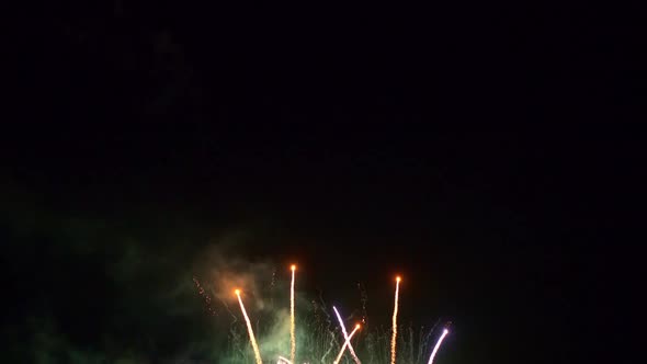 Colorful Firework display at night on sky background alt