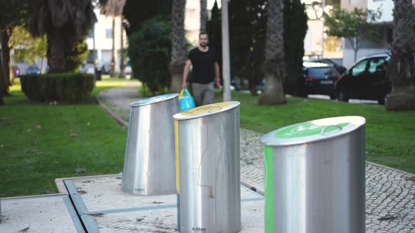 People Dispose of Metal Plastic Glass and Paper Wastes with Garbage Sorting alt