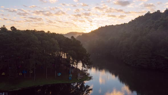 Aerial view, Morning view and dramatic sky over reservoir Pang Oung Lake. alt