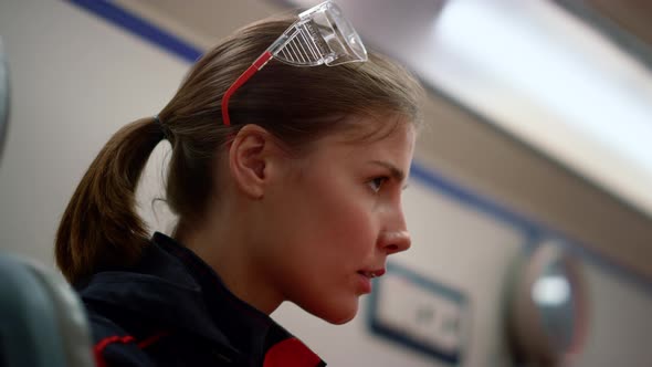 Sleepy Paramedic Sitting in Emergency Car alt