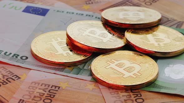 Euro Banknotes Euro Bills Rotation Coin With Symbol of Cryptocurrency of Bitcoin