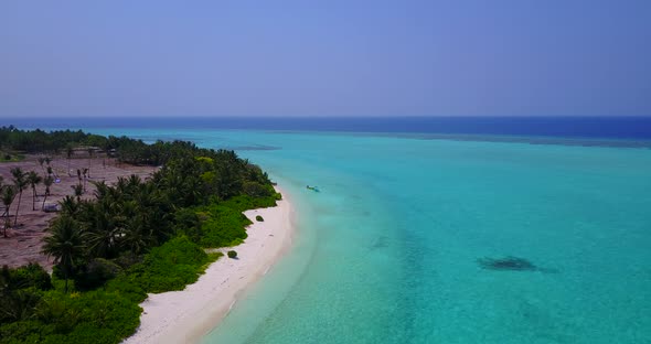 Tropical overhead clean view of a white sandy paradise beach and blue ocean background in colorful 4 alt
