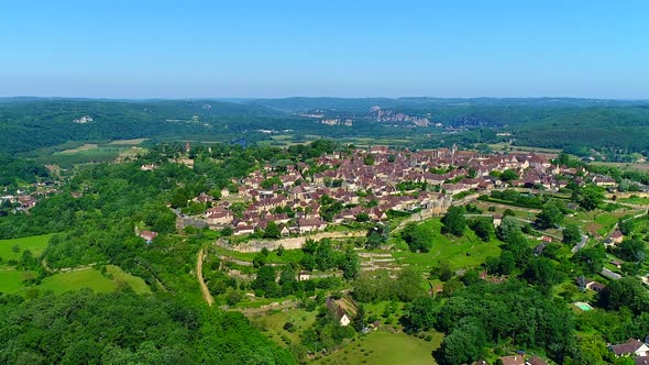 Village of Domme in the Perigord Noir in France seen from the sky alt