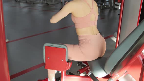 Young woman training in a sports club