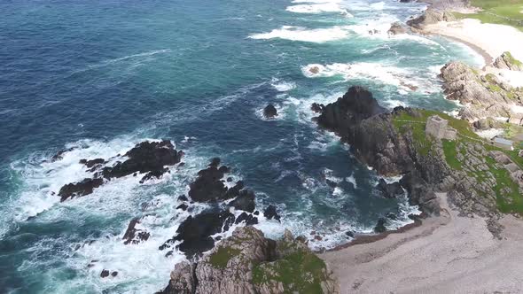 Aerial View of the Beautiful Coast Next To Carrickabraghy Castle - Isle of Doagh, Inishowen, County alt