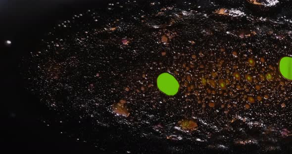 Old film strip burn with bubble.plastic burning bubbles fire closeup 35mm old film alt