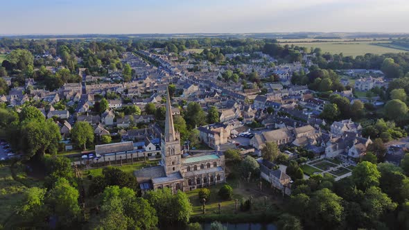 Aerial Drone View of Cotswolds Village and Burford Church in England, a Popular English Picturesque alt