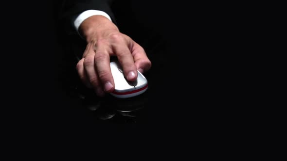 Businessman using mouse alt