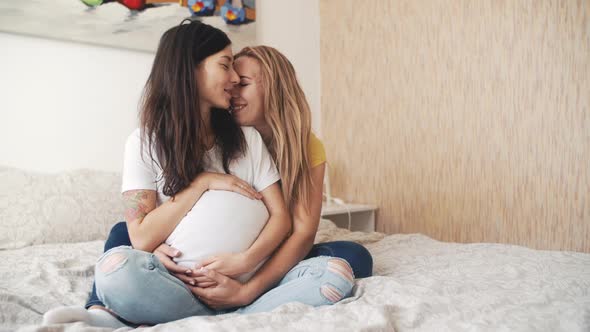 Happy Pregnant Asian Korean Woman with Friend Talking and Laughing While Celebrating Baby Shower at alt