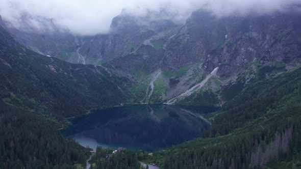 view of the blue mountain lake from a quadcopter morskie oko landmark of poland tatras buried europe alt