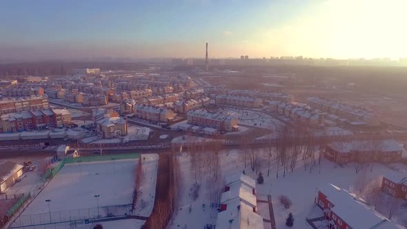 Aerial view of a Russian suburb or Moscow on a bright, cold, winter's day alt