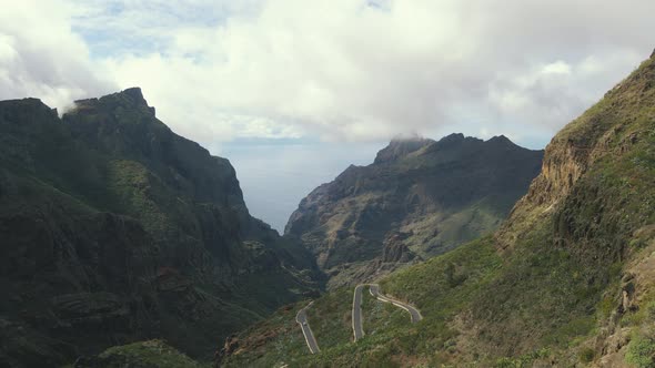 Aerial View of Mountain Road and Town in Masca Valley alt