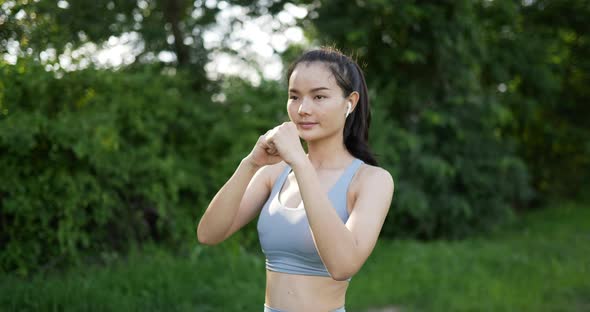 Woman punching the air alt