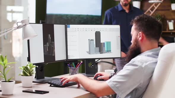 In Creative Media House Two Professional Architects Are Using 3D Software alt