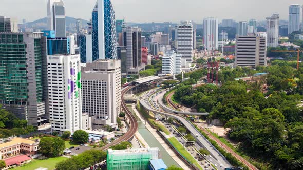 Kuala Lumpur Time Lapse Cityscape Malaysia Transport Interchange Metro at Noon alt