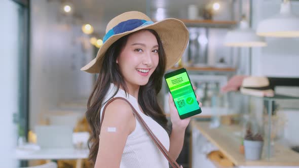 Asian female cheerful smiling teenager hand gesture point show vaccine brand alt