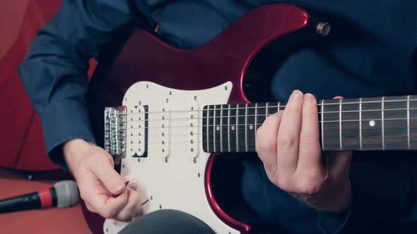 Men Hands Play the Electric Guitar with Vibrato Technique