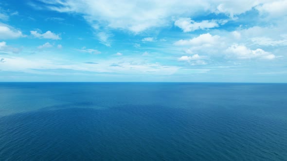 4K Aerial view of drone move on beautiful sea. Flight over ocean, open sea. alt