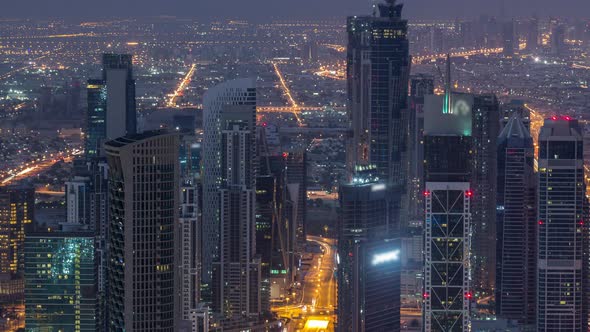 Dubai Downtown Skyline Futuristic Cityscape with Many Skyscrapers and Burj Khalifa Aerial Night to alt