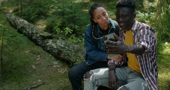 Young Black African American Couple Does Selfie at the Forest Camp   60p Prores