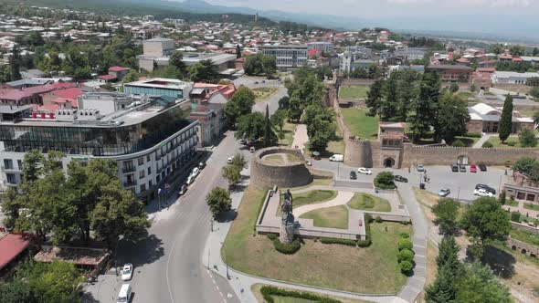 Aerial view of Monument of King Erekle II in Telavi. flying over Batonis Tsikhe alt