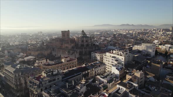 Regal Granada Cathedral standing proud above city skyline; Spain