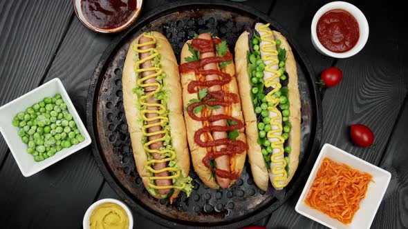Vegeterian Hot Dogs Served with Tomatoes Avacado Onion and Buns Over Wooden Background alt