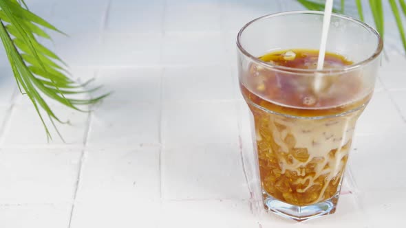 Making iced coffee cocktail