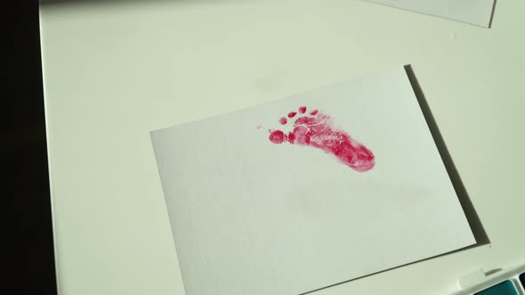 Fingerprints of a Small Child on White Paper alt