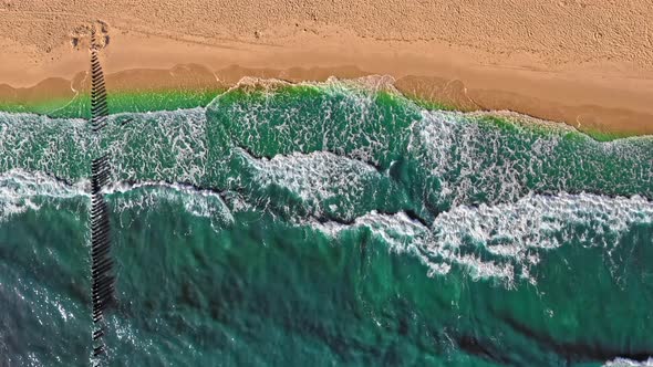 Waves on Baltic sea. Tourism in Poland. Aerial view alt