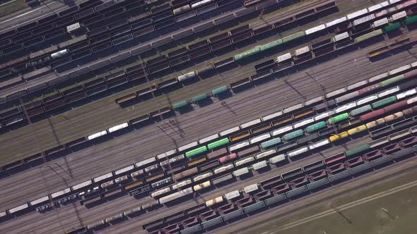 Aerial View of Railway Sorting Station and A Lot of Wagons at a Railway alt