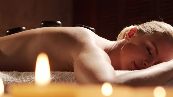 Young and sporty girl in sportswear is doing exercises at home. alt