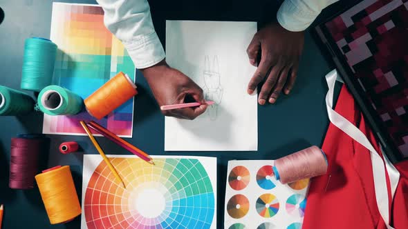 Top View of a Sketch Getting Done By a Designer alt