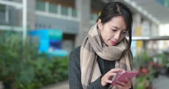 Woman use of mobile phone  alt