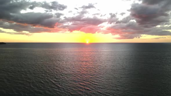 Sunset from drone in beach in west coast of Puerto Rico caribbean sea. alt