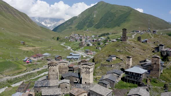 Medieval towers of Ushguli in Georgia. Aerial view towers in Svaneti Region of Georgia.  alt