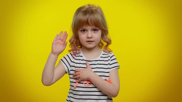 Child Kid Swear to Be Honest Aising Hand to Take Oath Promising to Tell Truth Keeping Hand on Chest alt