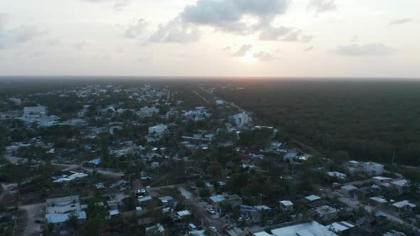 Establisher Slow Motion Shot of Rooftop of Traditional Houses and Buildings Under a Cloudy Sky alt
